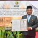 Manager Commrel dan CSR Terima Tanda Kehormatan dari Presiden